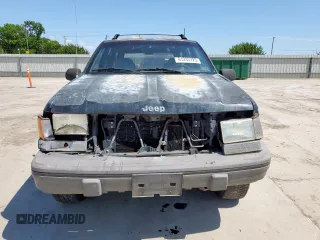 1995 Jeep Grand Cherokee Laredo z VIN 1J4FX58S9SC534442, wystawiony jako Copart lot #61233725 z przebiegiem 363 688 mil mil oraz Szkoda całkowita • Salvage title. Historia ofert i sprzedaży dostępna na DreamBid. Obrazek 5.
