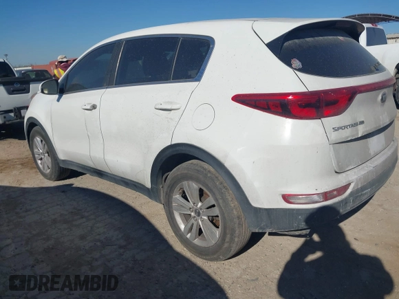 2018 Kia Sportage LX with VIN KNDPM3AC2J7445877, listed as a IAAI auction lot 41749884 with 150,320 mi miles and . Bid and sale history available at DreamBid. Image 3.