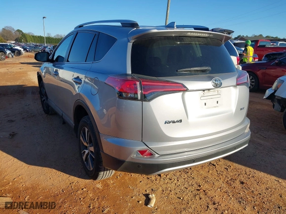2016 Toyota RAV4 XLE with VIN 2T3WFREV0GW282440, listed as a IAAI auction lot 41293586 with 71,723 mi miles. Bid and sale history available at carsss.com. Image 3.