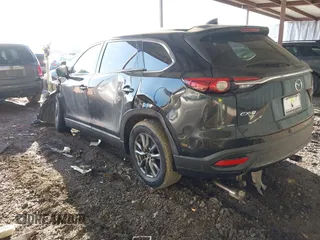 2016 Mazda CX-9 Touring with VIN JM3TCACY8G0102157, listed as a IAAI auction lot 41670673 with 87,796 mi miles and . Bid and sale history available at carsss.com. Image 3.