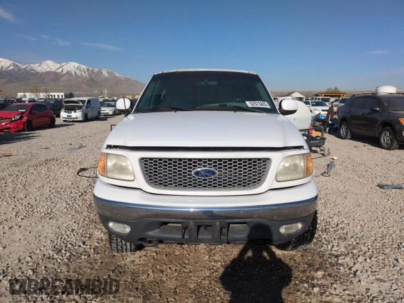 1999 Ford F-150 XL with VIN 1FTRX18L2XKA97143, listed as a Copart auction lot 52973695 with 115,180 mi miles and Salvage Title. Bid and sale history available at carsss.com. Image 5.