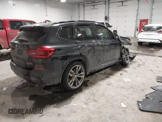2019 BMW X3 M40i with VIN 5UXTS3C52KLR73137, listed as a IAAI auction lot 41632965 with 76,713 mi miles and . Bid and sale history available at DreamBid. Image 4.