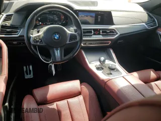 2022 BMW X6 xDrive40i z VIN 5UXCY6C0XN9K78927, wystawiony jako Copart lot #48348335 z przebiegiem 63 074 mil mil oraz Szkoda całkowita • Salvage title. Historia ofert i sprzedaży dostępna na DreamBid. Obrazek 8.