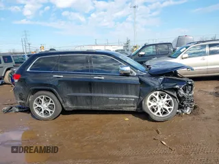 2019 Jeep Grand Cherokee Overland with VIN 1C4RJFCGXKC688543, listed as a IAAI auction lot 41643678 with 65,182 mi miles. Bid and sale history available at carsss.com. Image 14.
