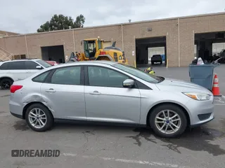 2015 Ford Focus SE z VIN 1FADP3F21FL218369, wystawiony jako IAAI lot #42126986 z przebiegiem 99 844 mil mil oraz . Historia ofert i sprzedaży dostępna na DreamBid. Obrazek 13.