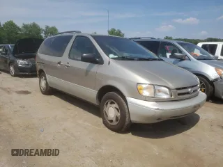 2000 Toyota Sienna LE with VIN 4T3ZF13C8YU219698, listed as a Copart auction lot 59733984 with 305,061 mi miles and Salvage Title. Bid and sale history available at carsss.com. Image 4.