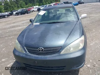 2003 Toyota Camry LE with VIN 4T1BE32K23U785060, listed as a IAAI auction lot 41825336 with 205,751 mi miles and . Bid and sale history available at DreamBid. Image 6.
