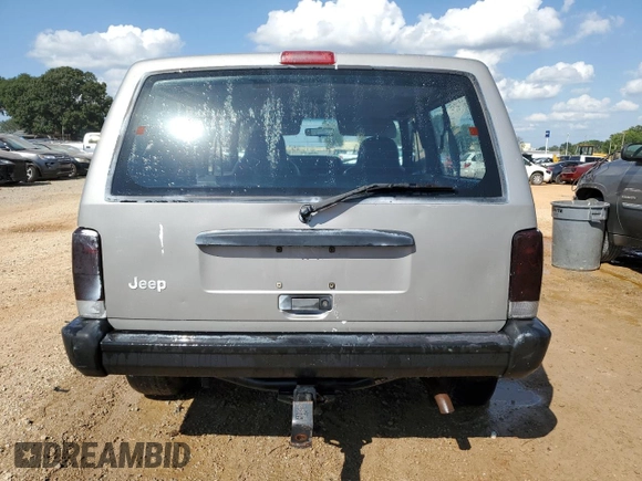 2000 Jeep Cherokee SE with VIN 1J4FT27P6YL127419, listed as a Copart auction lot 74211284 with 199,078 mi miles and Clean title. Bid and sale history available at DreamBid. Image 6.
