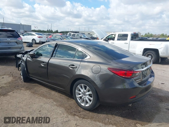 2016 Mazda Mazda6 i Sport with VIN JM1GJ1U56G1422012, listed as a IAAI auction lot 40693636 with 93,094 mi miles. Bid and sale history available at carsss.com. Image 3.