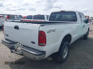 2001 Ford Super Duty F-250 XL with VIN 1FTNX21F31EB96018, listed as a IAAI auction lot 41891819 with 207,264 mi miles. Bid and sale history available at carsss.com. Image 4.