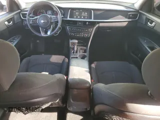 2019 Kia Optima LX z VIN 5XXGT4L30KG312534, wystawiony jako Copart lot #56564075 z przebiegiem 111 012 mil mil oraz Szkoda całkowita • Salvage title. Historia ofert i sprzedaży dostępna na DreamBid. Obrazek 8.