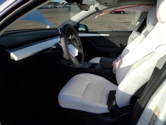 2024 Tesla Model Y Long Range with VIN 7SAYGDEE1RF036260, listed as a Copart auction lot 78805764 with 7,850 mi miles and Non repairable. Bid and sale history available at DreamBid. Image 7.