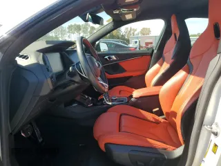 2020 BMW 2 Series M235i xDrive with VIN WBA13AL07L7F58999, listed as a Copart auction lot 77858084 with 19,833 mi miles and Salvage Title. Bid and sale history available at carsss.com. Image 7.