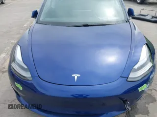 2021 Tesla Model 3 Long Range with VIN 5YJ3E1EB6MF878411, listed as a IAAI auction lot 41986947 with 71,978 mi miles and . Bid and sale history available at DreamBid. Image 10.