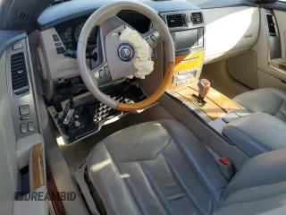 2006 Cadillac XLR z VIN 1G6YV36A765600678, wystawiony jako Copart lot #88111045 z przebiegiem 46 257 mil mil oraz Nie do naprawy • Non repairable. Historia ofert i sprzedaży dostępna na DreamBid. Obrazek 8.
