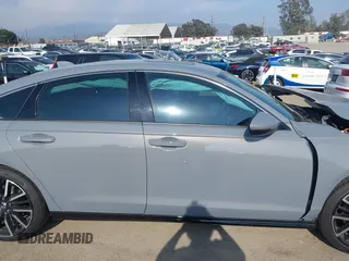 2024 Honda Accord Touring with VIN 1HGCY2F8XRA070757, listed as a IAAI auction lot 42181104 with 12,326 mi miles and . Bid and sale history available at DreamBid. Image 14.