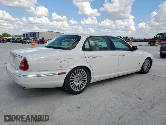 2006 Jaguar XJ Vanden Plas with VIN SAJWA82B16SH06996, listed as a Copart auction lot 62509025 with 80,236 mi miles and Salvage title. Bid and sale history available at DreamBid. Image 3.