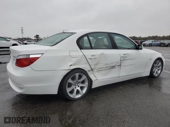2006 BMW 5 Series 550i with VIN WBANB535X6CP01394, listed as a Copart auction lot 81225264 with 124,599 mi miles and Salvage Title. Bid and sale history available at DreamBid. Image 3.