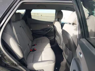 2017 Hyundai Santa Fe 2.4L z VIN 5XYZU3LB5HG425830, wystawiony jako IAAI lot #41428863 z przebiegiem 76 366 mil mil oraz . Historia ofert i sprzedaży dostępna na DreamBid. Obrazek 8.