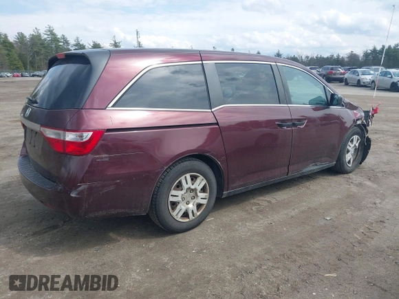 2013 Honda Odyssey LX with VIN 5FNRL5H26DB010444, listed as a IAAI auction lot 42039693 with 173,863 mi miles and . Bid and sale history available at carsss.com. Image 4.