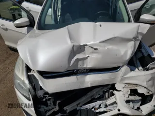 2013 Ford Escape SEL with VIN 1FMCU0HX4DUA84806, listed as a Copart auction lot 62593805 with 107,147 mi miles and Salvage title. Bid and sale history available at DreamBid. Image 12.