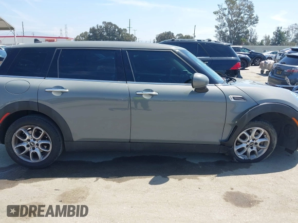 2019 MINI Clubman Cooper with VIN WMWLN5C57K2E34894, listed as a IAAI auction lot 42072962 with 49,274 mi miles and . Bid and sale history available at DreamBid. Image 13.
