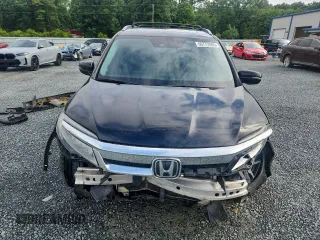 2019 Honda Pilot Elite with VIN 5FNYF6H05KB071031, listed as a Copart auction lot 60777585 with 96,155 mi miles and Salvage title. Bid and sale history available at DreamBid. Image 5.