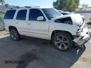 2001 Chevrolet Tahoe LT z VIN 1GNEK13T21J264755, wystawiony jako IAAI lot #42020988 z przebiegiem 290 492 mil mil oraz . Historia ofert i sprzedaży dostępna na DreamBid. Obrazek 1.