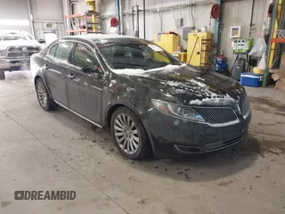 2014 Lincoln MKS with VIN 1LNHL9DK8EG609955, listed as a IAAI auction lot 41580770 with 109,864 mi miles. Bid and sale history available at carsss.com. Image 1.