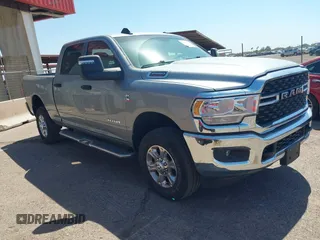 2024 Ram 2500 Big Horn with VIN 3C6UR5DL5RG100751, listed as a IAAI auction lot 42581273 with 15,353 mi miles and . Bid and sale history available at DreamBid. Image 1.