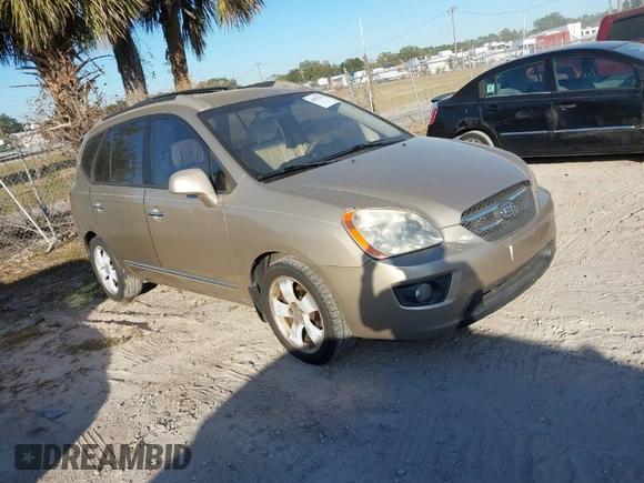 2007 Kia Rondo LX with VIN KNAFG526977114033, listed as a IAAI auction lot 40967531 with 126,761 mi miles. Bid and sale history available at carsss.com. Image 1.