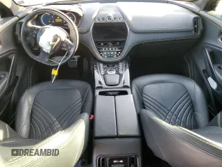 2022 Aston Martin DBX z VIN SD7VUJAW1NTV04534, wystawiony jako Copart lot #87969325 z przebiegiem 17 373 mil mil oraz Szkody całkowita. Historia ofert i sprzedaży dostępna na DreamBid. Obrazek 8.