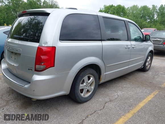 2011 Dodge Grand Caravan Crew with VIN 2D4RN5DG7BR786789, listed as a IAAI auction lot 42141124 with 167,353 mi miles and . Bid and sale history available at DreamBid. Image 4.