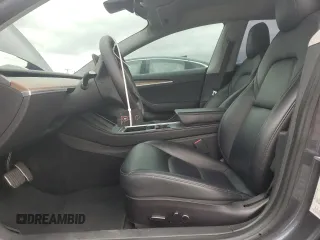 2022 Tesla Model 3 Long Range with VIN 5YJ3E1EB9NF117339, listed as a Copart auction lot 55659415 with 87,479 mi miles and Salvage Title. Bid and sale history available at DreamBid. Image 7.