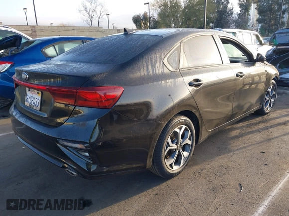 2021 Kia Forte FE with VIN 3KPF24AD1ME407089, listed as a IAAI auction lot 41707743 with 34,411 mi miles. Bid and sale history available at carsss.com. Image 4.