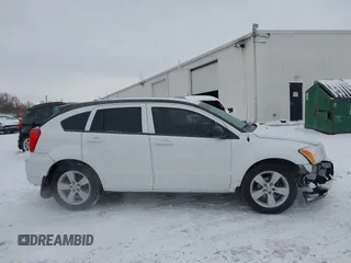 2011 Dodge Caliber Mainstreet with VIN 1B3CB3HAXBD237906, listed as a IAAI auction lot 41589696 with 135,909 mi miles and . Bid and sale history available at DreamBid. Image 13.