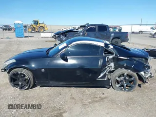 2004 Nissan 350Z Touring with VIN JN1AZ34D94M102990, listed as a IAAI auction lot 41830661 with 107,520 mi miles. Bid and sale history available at carsss.com. Image 15.