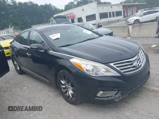 2013 Hyundai Azera z VIN KMHFH4JG4DA243182, wystawiony jako IAAI lot #42403300 z przebiegiem 237 975 mil mil oraz . Historia ofert i sprzedaży dostępna na DreamBid. Obrazek 1.