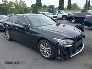 2015 Infiniti Q50 z VIN JN1BV7AP3FM336566, wystawiony jako IAAI lot #42349544 z przebiegiem 84 077 mil mil oraz . Historia ofert i sprzedaży dostępna na DreamBid. Obrazek 1.