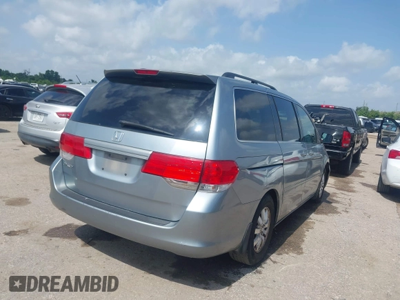 2010 Honda Odyssey EX with VIN 5FNRL3H42AB002679, listed as a IAAI auction lot 42692701 with 179,905 mi miles and . Bid and sale history available at DreamBid. Image 4.