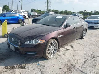 2013 Jaguar XJ Portfolio with VIN SAJWJ2GD2D8V44780, listed as a IAAI auction lot 41875069 with 87,806 mi miles and . Bid and sale history available at DreamBid. Image 2.