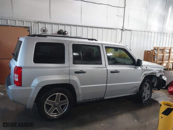 2009 Jeep Patriot Sport with VIN 1J4FT28BX9D160194, listed as a IAAI auction lot 41253940 with 104,339 mi miles. Bid and sale history available at carsss.com. Image 13.
