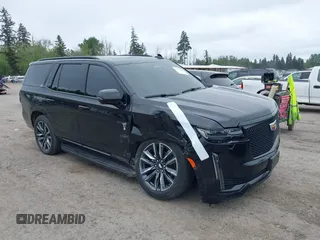 2023 Cadillac Escalade 4WD Sport z VIN 1GYS4EKL7PR185858, wystawiony jako IAAI lot #39413690 z przebiegiem 32 987 mil mil oraz . Historia ofert i sprzedaży dostępna na DreamBid. Obrazek 1.