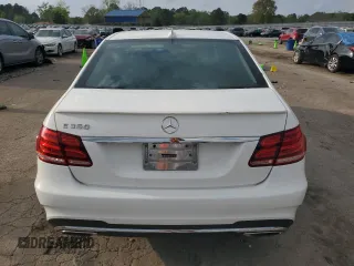 2014 Mercedes-Benz E 350 Sport with VIN WDDHF5KB9EA900559, listed as a Copart auction lot 51069705 with 137,278 mi miles and Salvage title. Bid and sale history available at DreamBid. Image 6.
