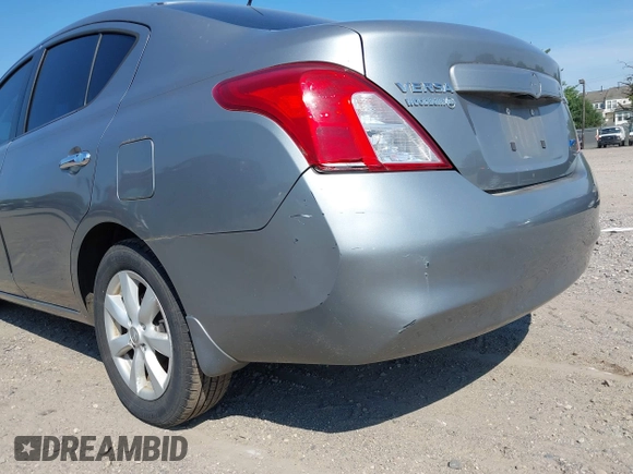 2012 Nissan Versa SV with VIN 3N1CN7AP2CL945917, listed as a IAAI auction lot 42608281 with 142,592 mi miles and . Bid and sale history available at DreamBid. Image 12.