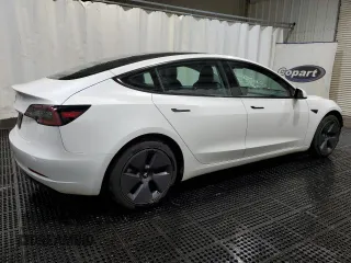 2022 Tesla Model 3 with VIN 5YJ3E1EA6NF370092, listed as a Copart auction lot 54396245 with 98,048 mi miles and Clean Title. Bid and sale history available at DreamBid. Image 3.