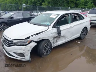 2021 Volkswagen Jetta S z VIN 3VWC57BU9MM103778, wystawiony jako IAAI lot #42493041 z przebiegiem 74 723 mil mil oraz . Historia ofert i sprzedaży dostępna na DreamBid. Obrazek 2.