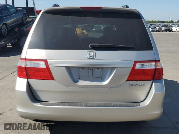 2005 Honda Odyssey EX-L z VIN 5FNRL386X5B407129, wystawiony jako Copart lot #56366655 z przebiegiem 181 893 mil mil oraz Szkoda całkowita • Salvage title. Historia ofert i sprzedaży dostępna na DreamBid. Obrazek 6.