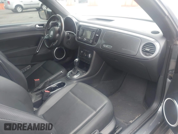 2013 Volkswagen Beetle 2.5L with VIN 3VWJP7AT6DM667477, listed as a IAAI auction lot 42215545 with 87,392 mi miles and . Bid and sale history available at DreamBid. Image 5.