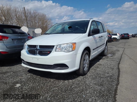 2014 Dodge Grand Caravan American Value with VIN 2C4RDGBGXER413961, listed as a Copart auction lot 54748405 with 146,589 mi miles and Clean Title. Bid and sale history available at DreamBid. Image 2.